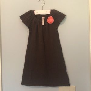 Brown dress with coral pink crochet bow detail